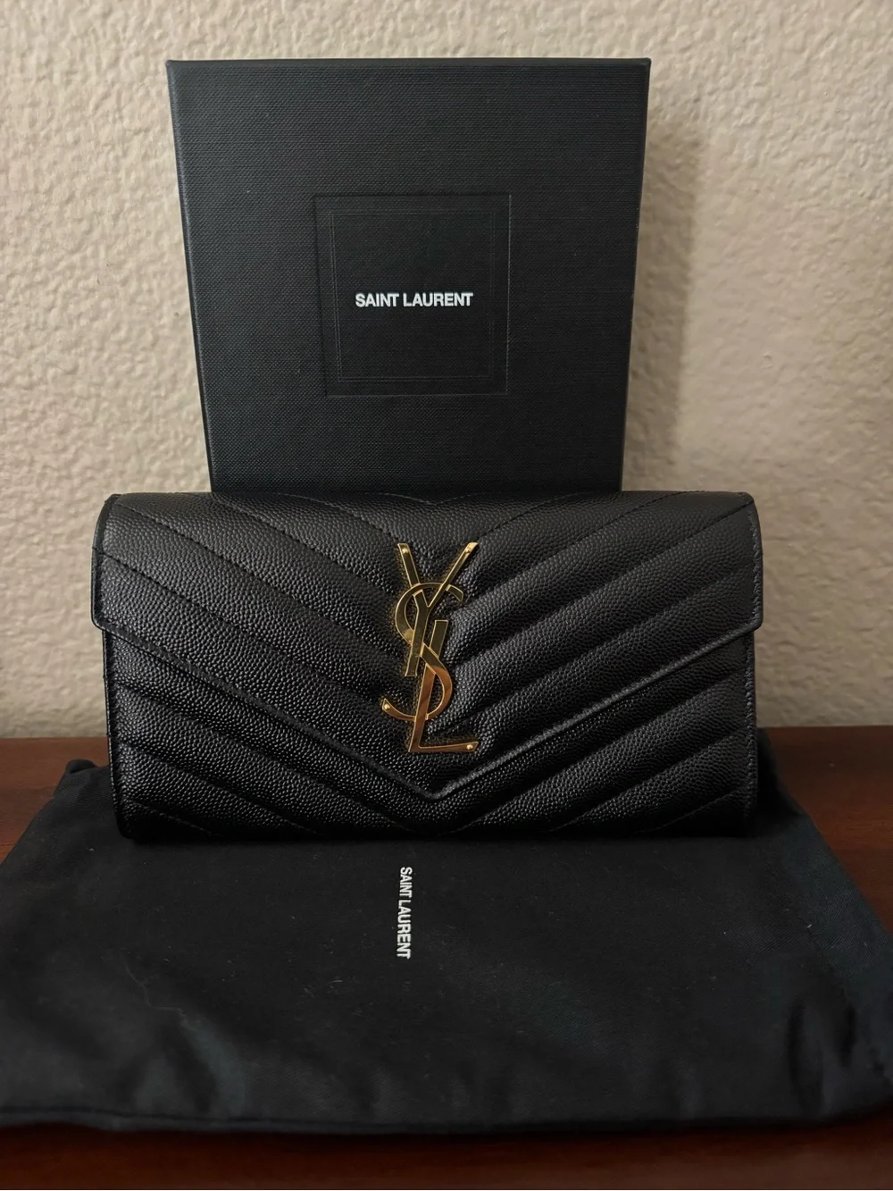Saint Laurent Cassandre YSL Monogram Large Flap Wallet in grained leather